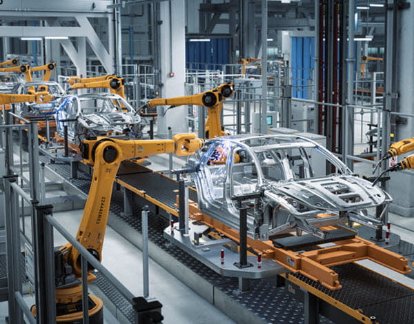 Automated Robot Arm Assembly Line Manufacturing High-Tech Green Energy Electric Vehicles. Construction, Building, Welding Industrial Production Conveyor.